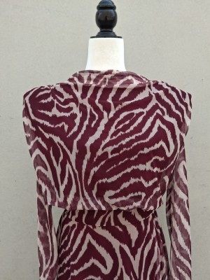 Completo color crema con stampa zebrata